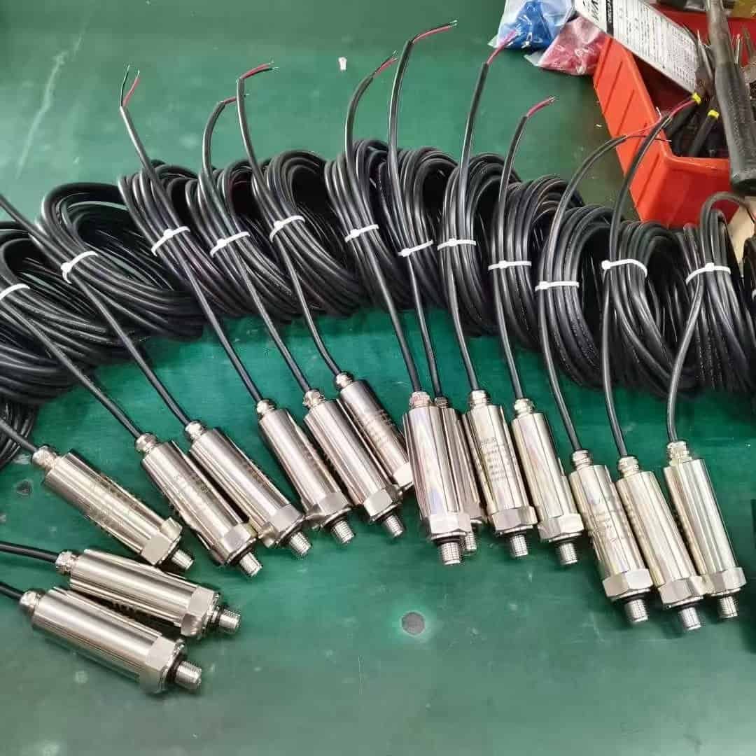 Industrial pressure transmitters showing gauge, absolute, differential, and remote-seal reference types laid out for comparison
